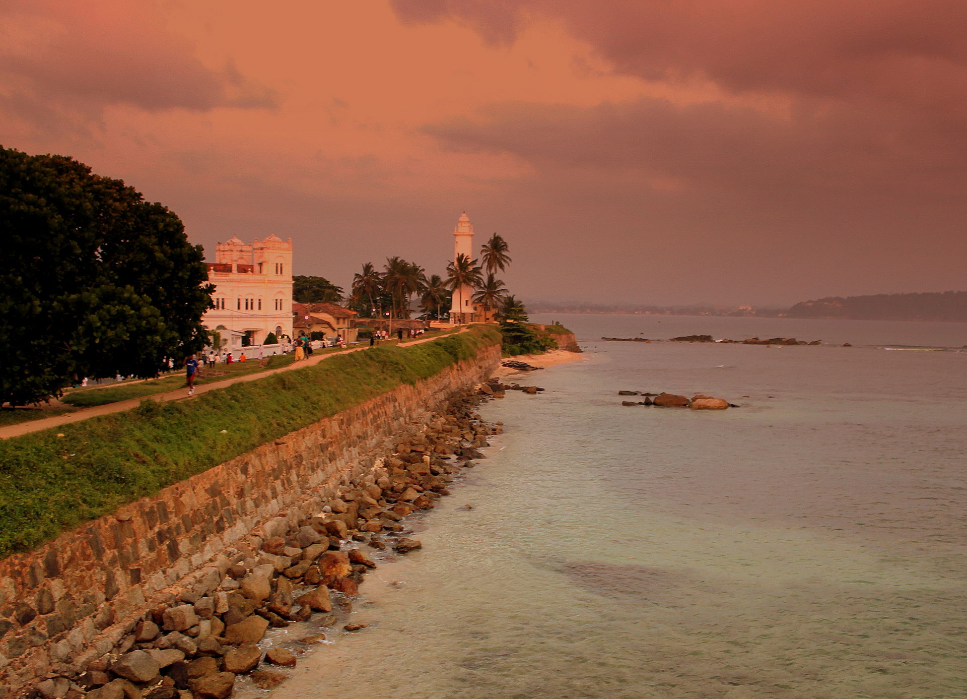 The lighthouse and ramparts of Galle Fort against the Indian Ocean
