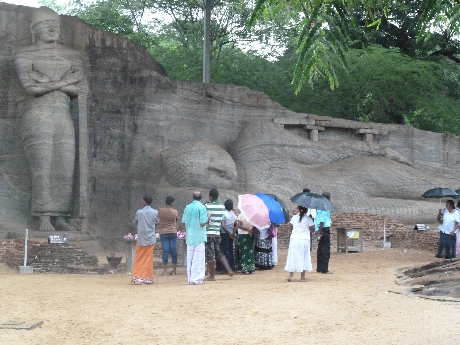 The reclining and standing Buddha figures carved from granite at Gal Vihara, Polonnaruwa